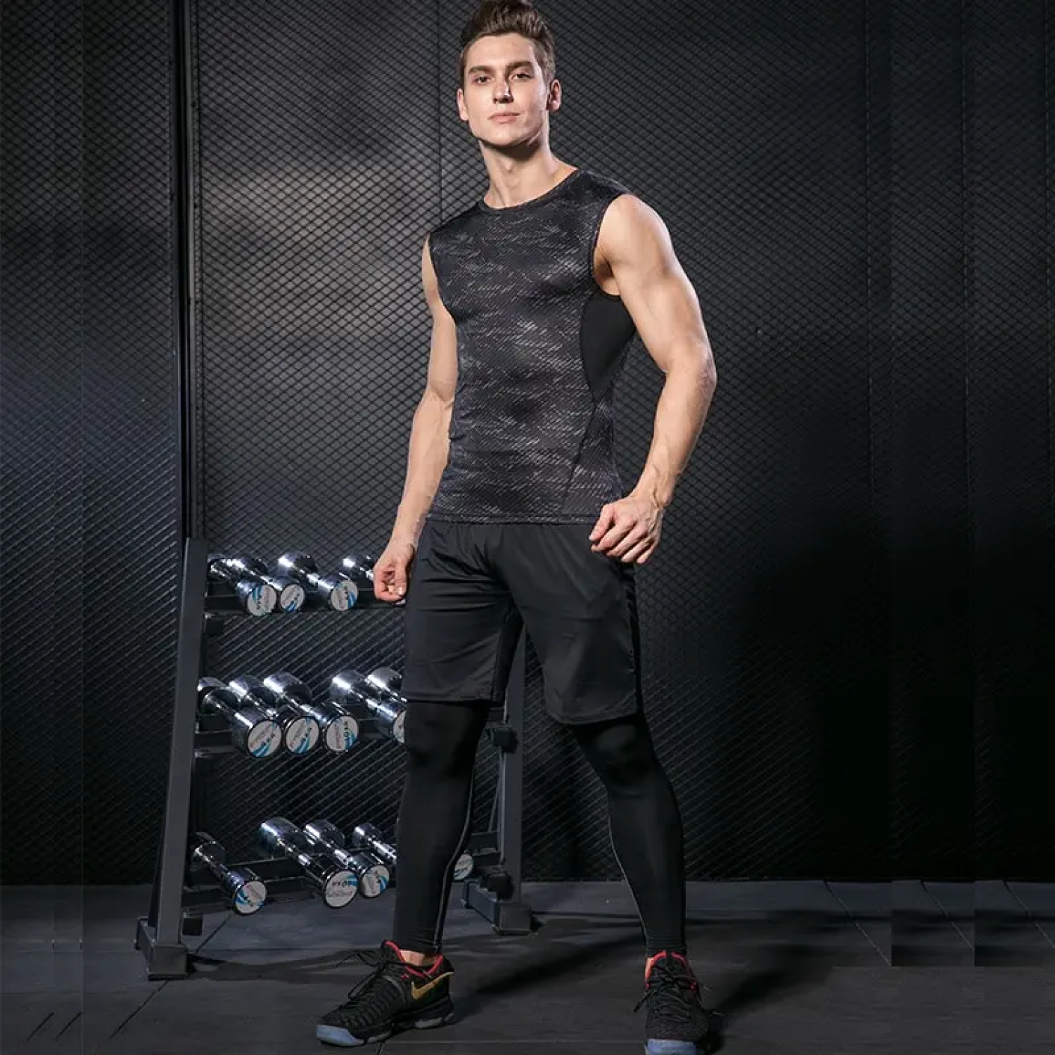 a boy waearing black color wholesale mens sportswear at a gym