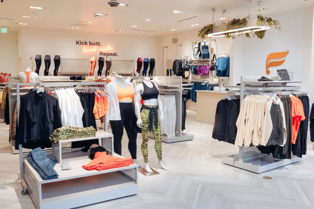 Activewear displayed on a store made by different active clothing manufacturers. 