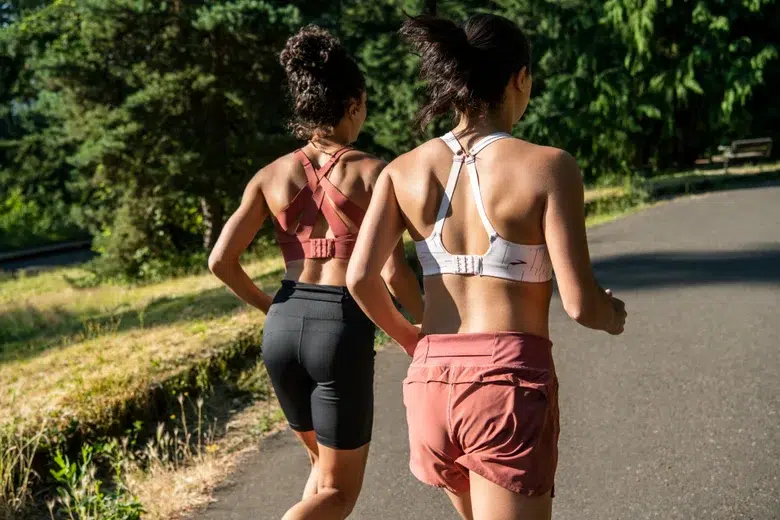 Two women running wearing running underwear