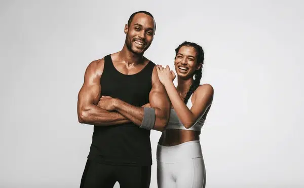 A couple showcasing what to wear to the gym 